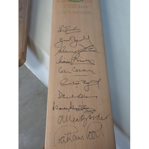 495 - A Duncan Fearnley Cricket Bat with signatures by players who have achieved 7000 runs in Test Matches... 