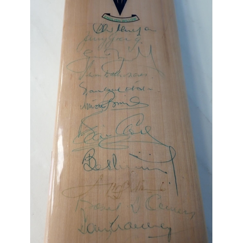 495 - A Duncan Fearnley Cricket Bat with signatures by players who have achieved 7000 runs in Test Matches... 