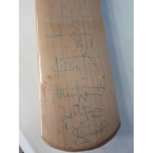 495 - A Duncan Fearnley Cricket Bat with signatures by players who have achieved 7000 runs in Test Matches... 