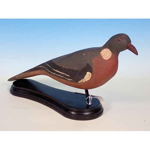 498 - A carved and painted Woodpigeon Decoy with glass eyes on ebonised stand 15in L