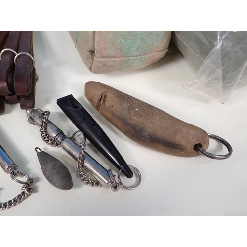 512 - Two dog training Dummies, Acme Whistle, plastic Whistle, leather Game Carrier, etc.