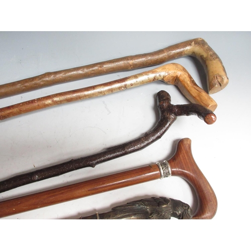 518 - Eight vintage Walking Sticks