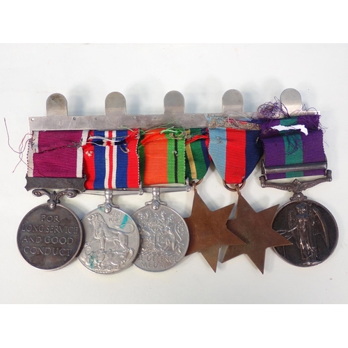 575 - A 1939/45 Trio, Pacific Star, Regular Army & Good Conduct Medals, and a Palestine Medal with bar, en... 