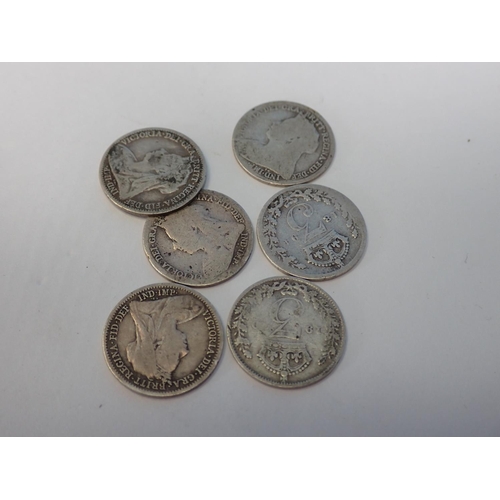 583 - A collection of British Coins to include an 1889 Crown, 1816 Shilling, a quantity of silver Threepen... 