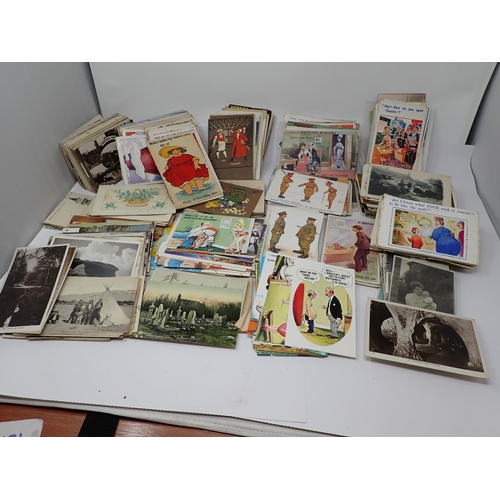 65 - A large quantity of humerous Postcards and some topographical subjects