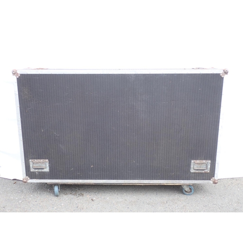 652 - A large Flight Case, 69in W x 15in H x 40in D fitted with casters