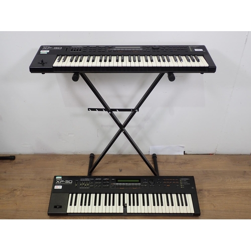 655 - Two Roland XP-30, Electric Keyboards with 64 Voice Expandable Synthesizers, one A/F, one Stand