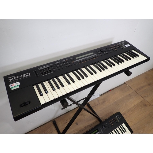 655 - Two Roland XP-30, Electric Keyboards with 64 Voice Expandable Synthesizers, one A/F, one Stand