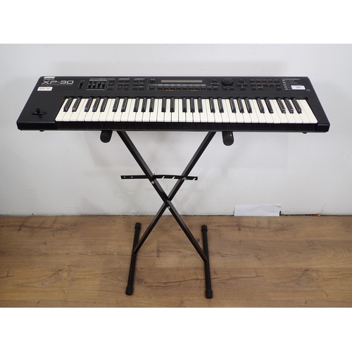 656 - A Roland XP-30, Electric Keyboard with 64 Voice Expandable Synthesizer on Stand