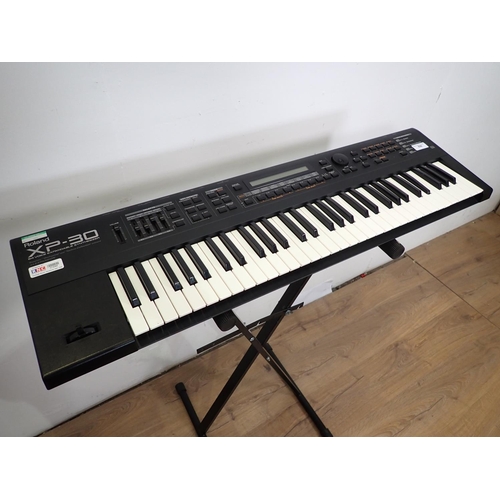 656 - A Roland XP-30, Electric Keyboard with 64 Voice Expandable Synthesizer on Stand