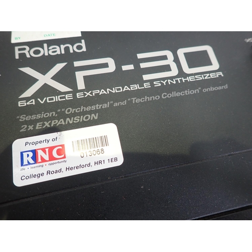 656 - A Roland XP-30, Electric Keyboard with 64 Voice Expandable Synthesizer on Stand