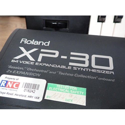 658 - Two Roland XP-30, Electric Keyboards with 64 Voice Expandable Synthesizers (one A/F), one Table Stan... 