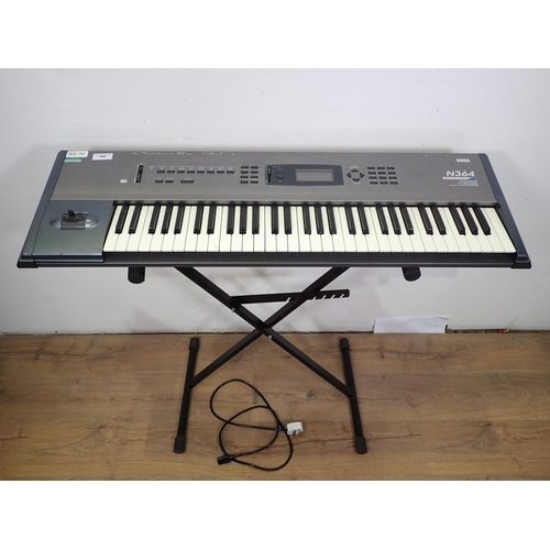 660 - A Korg N364 Electric Keyboard on Stand