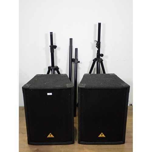 687 - A pair of Behringer 200W Speaker Cabinets with Stands and Speaker Poles