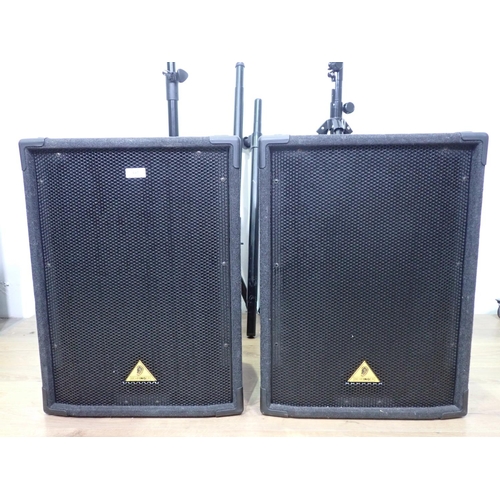 687 - A pair of Behringer 200W Speaker Cabinets with Stands and Speaker Poles