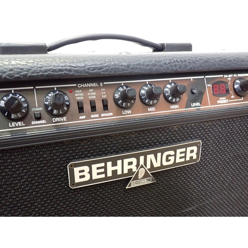 695 - A Behringer V-Tone GMX212 2x60W Stereo Guitar Amplifier and Foot Pedals