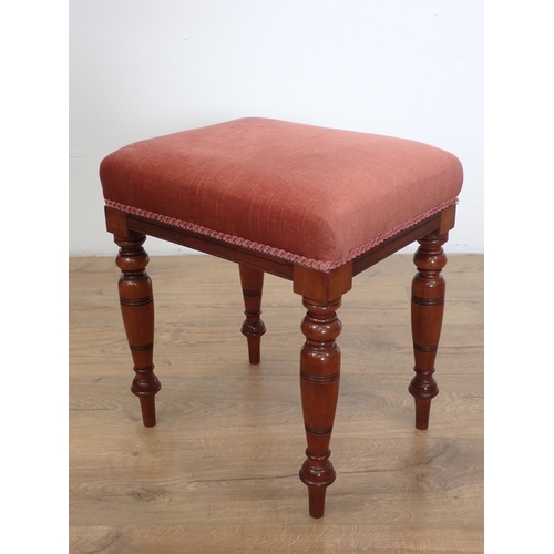 1012 - A Victorian square Stool on turned tapering legs