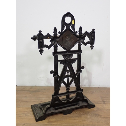 1016 - A Victorian cast iron Stick Stand with engraved brass rail, 17in, bears registration mark