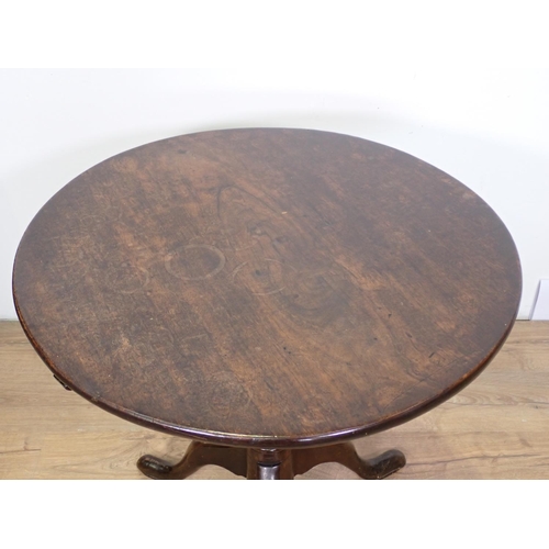 1021 - A Georgian mahogany Pillar Table with circular top on turned column and tripod base, 2ft 6in diam, s... 