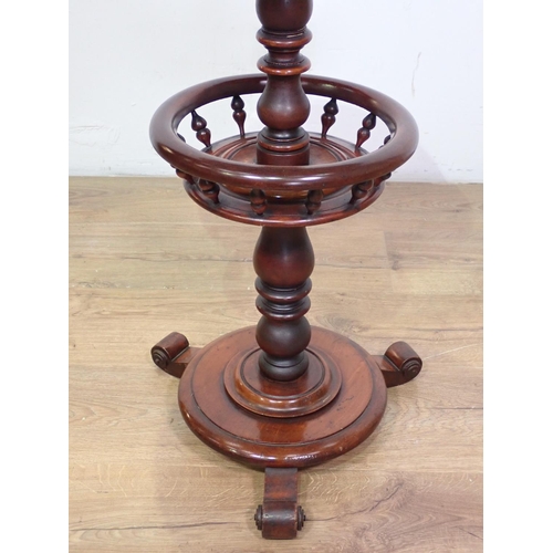 1028 - A 19th Century mahogany ship's type Pillar Table with circular top, spindle turned centre shelf on t... 