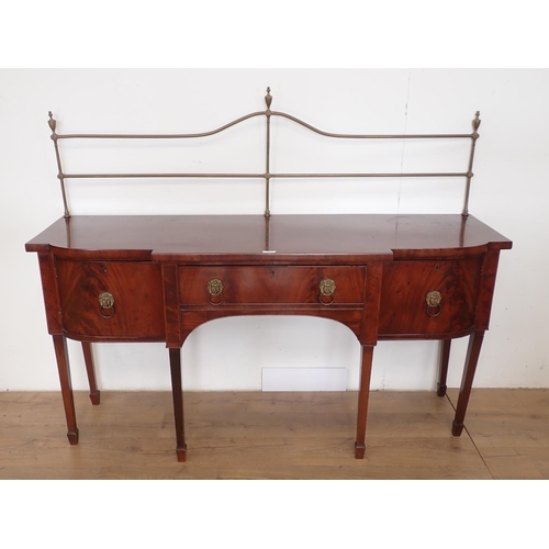 1038 - A Regency mahogany Sideboard with brass rail back, breakfront fitted central drawer flanked by cupbo... 