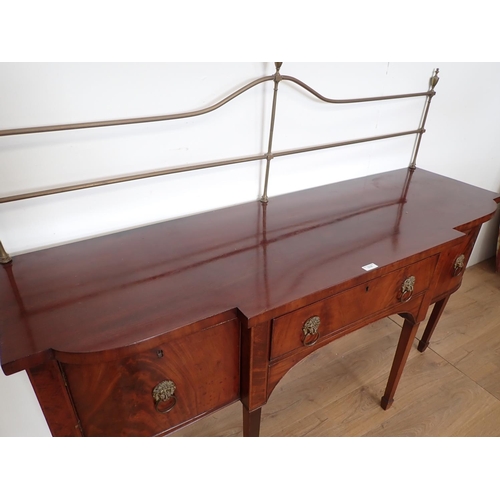 1038 - A Regency mahogany Sideboard with brass rail back, breakfront fitted central drawer flanked by cupbo... 