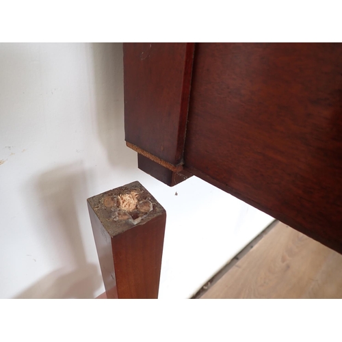 1038 - A Regency mahogany Sideboard with brass rail back, breakfront fitted central drawer flanked by cupbo... 