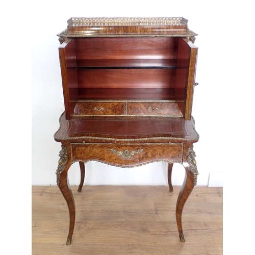 1047 - A 19th Century Louis XV style Bonheur du Jour with simulated walnut and kingwood staining, fitted pa... 