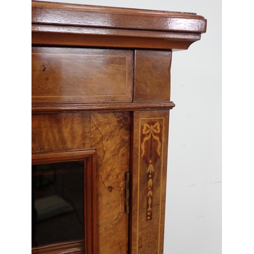 1050 - A Victorian burr walnut Pier Cabinet with pair of glazed doors, satinwood inlay on plinth, 3ft 8in