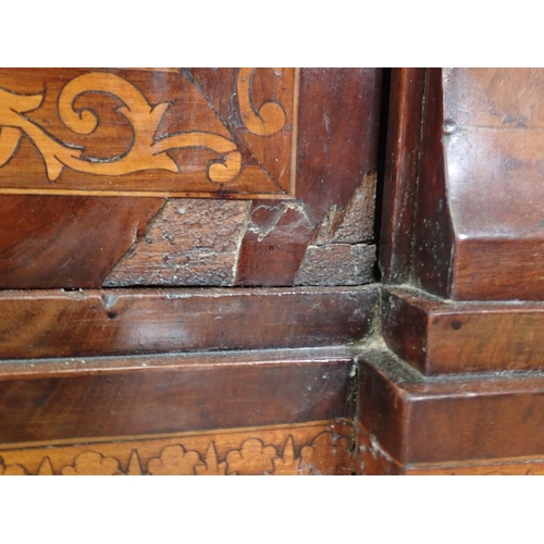 1052 - An antique Dutch marquetry Wine Cabinet with hinged lid revealing further hinged sections, the front... 