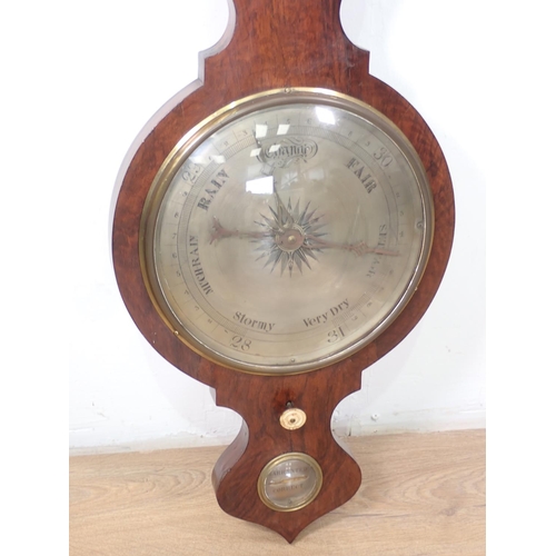 1067 - A Victorian rosewood cased Banjo Barometer and Thermometer with silvered dials, 3ft 4in