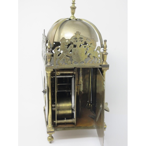 1075 - A brass cased antique Lantern Clock with single train fusee movement, anchor escapement, engraved di... 