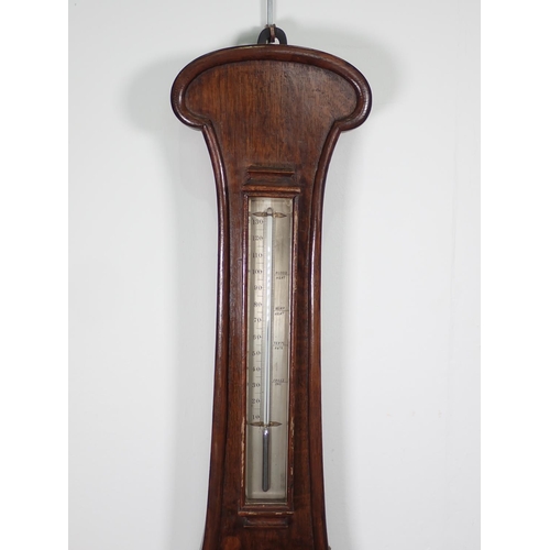 1077 - A Victorian Barometer and Thermometer with silvered dials inscribed Negretti & Zambra, 1 Hatton Gard... 