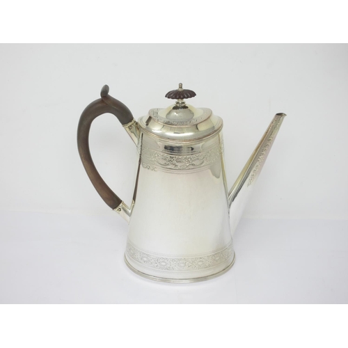 808 - A Victorian silver Coffee Pot of oval tapering form, London 1881