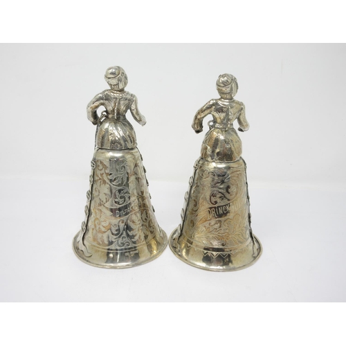 826 - A pair of Dutch silver Figural Stirrup Cups in the renaissance style, import marks London 1891