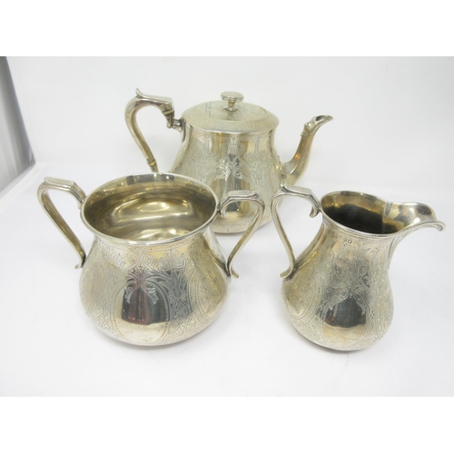 843 - A Victorian silver three piece Tea Service with engraved decoration, London 1873, 1430 gms