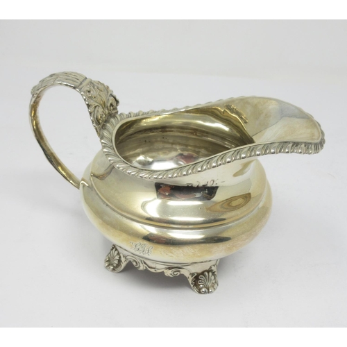 847 - A George IV silver Milk Jug with gadroon rim, marks worn