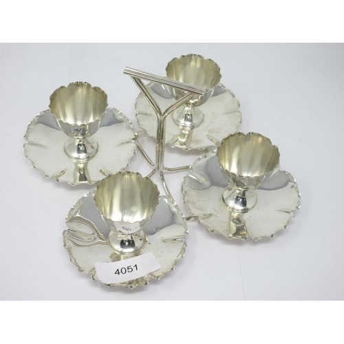 851 - An Edward VII silver four Egg Cup Set on Stand with triangular handle, London 1903, Goldsmiths & Sil... 