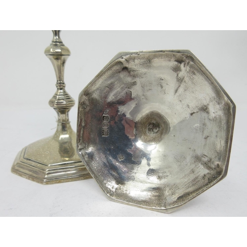 869 - A pair of Victorian silver Tapersticks on octagonal bases, London 1900, 4 1/2in