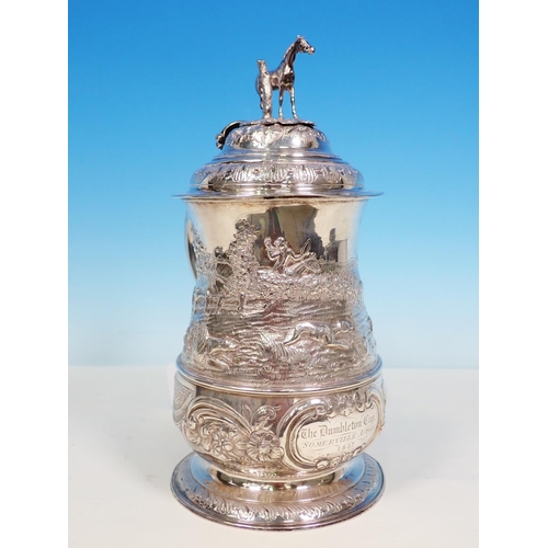 913 - A George II silver lidded Quart Tankard with later embossing of hunting scene and inscription 'The D... 