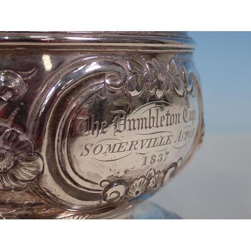 913 - A George II silver lidded Quart Tankard with later embossing of hunting scene and inscription 'The D... 