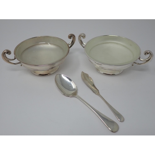 915 - A pair of George V silver two-handled Preserve dishes with glass liners, Birmingham 1914, cased