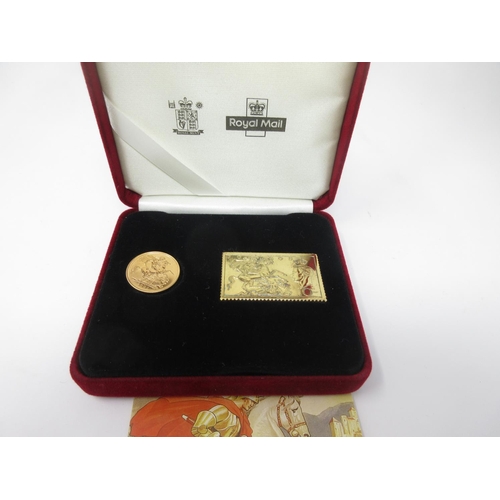 928 - An Elizabeth II St George and the Dragon Sovereign 2001, and gilded Ingot Set, in case, and a Britan... 