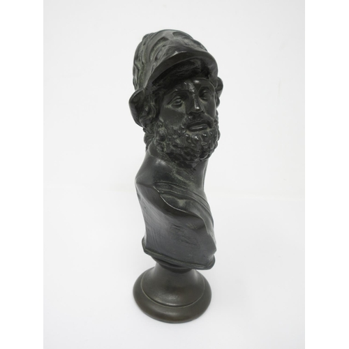 957 - A bronze effect Bust of Greek Figure with helmet, on circular base, 9in