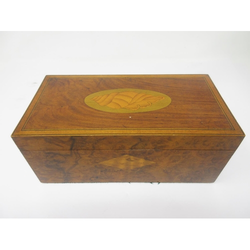 963 - A black and white Chess Set in a shell inlaid mahogany box, 9 x 4 1/2in