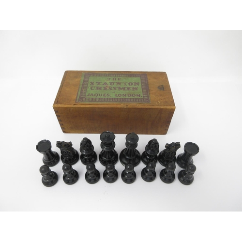 965 - A Staunton Chess Set in box with sliding lid, 8 x4in