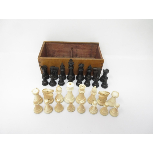 967 - A black and white Chess Set in two division box with sliding lid, 8x4in, several items A/F