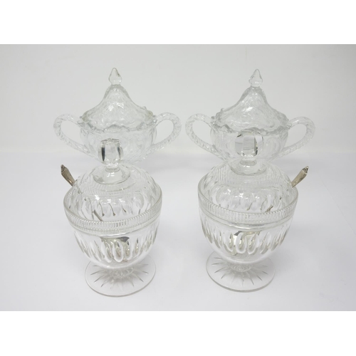 971 - A pair of cut glass Honey Jars and Covers on pedestal bases, 6in, with silver spoons and a pair of m... 