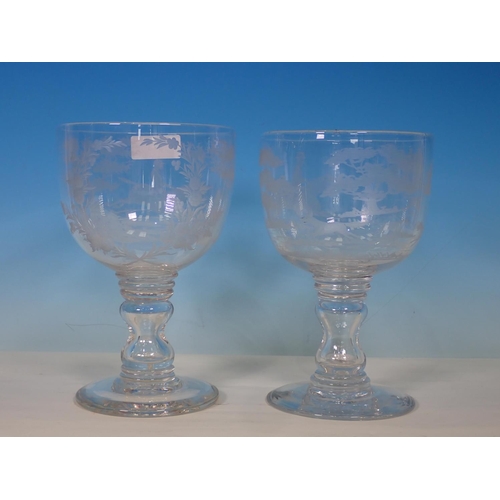 973 - A near pair of large glass Goblets finely etched with hunting scenes, 9in