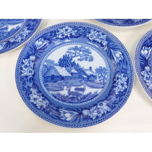 986 - A Wedgwood blue and white Fallow Deer Teapot, 8 Plates and a Saucer